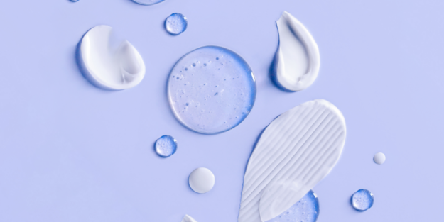 Blog – What Derms Do, Header Image Purple background with skincare products