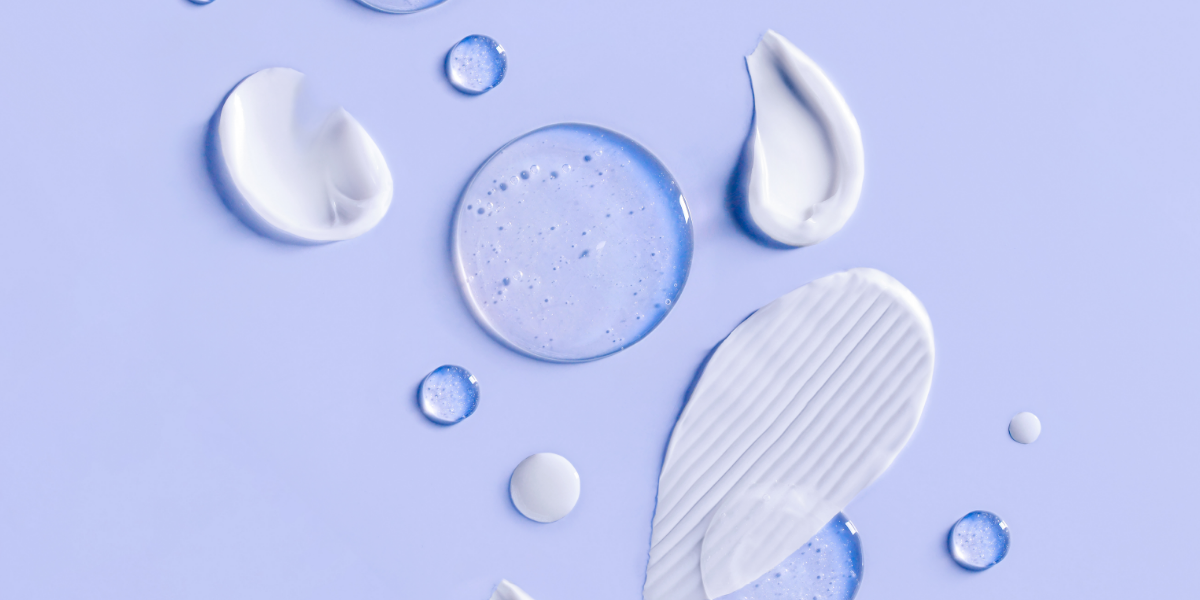 Purple background with skincare products